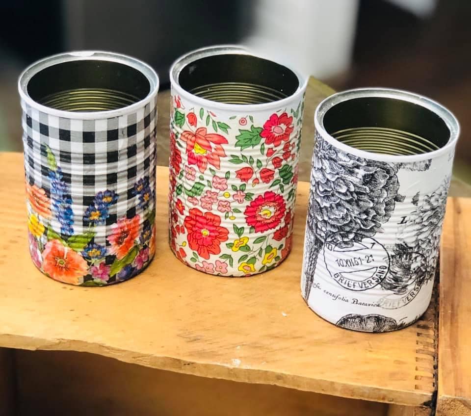 three decorative upcycled cans